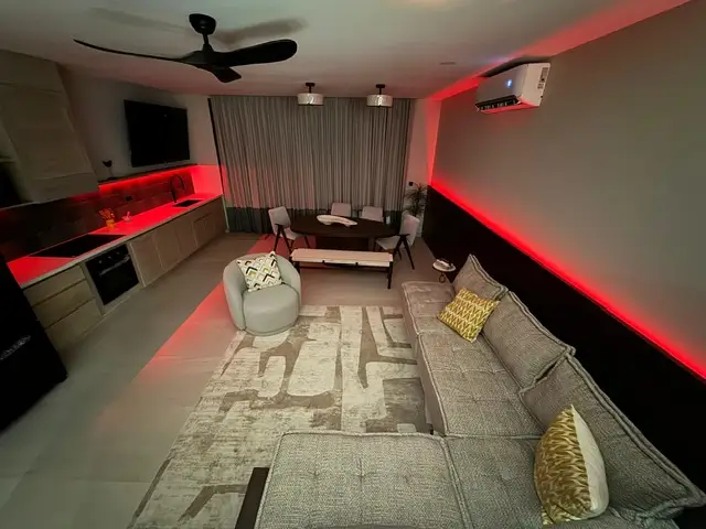 a living room with a couch and a table, pacific marlin