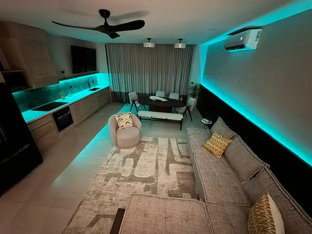 a living room with a couch and a table, malibu nicaragua sunset villas